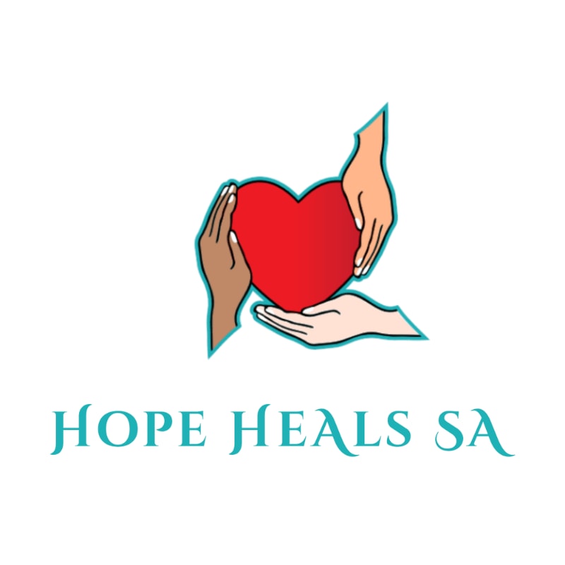 Two hands, one light-skinned and one dark-skinned, cradle a red heart in the foreground, with the words "HOPE HEALS SA" written in teal text below against a white background.