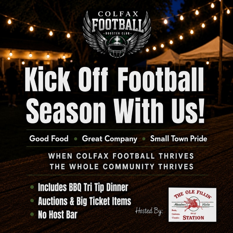 String lights illuminate a lively outdoor gathering with a large "Kick Off Football Season With Us!" banner in the foreground and tents and trees in the background.