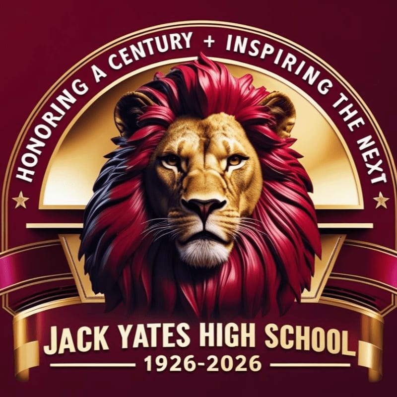A majestic lion with a red and gold mane is featured in the foreground, set against a dark red background with a golden arch and a banner proclaiming "JACK YATES HIGH SCHOOL 1926-2026".
