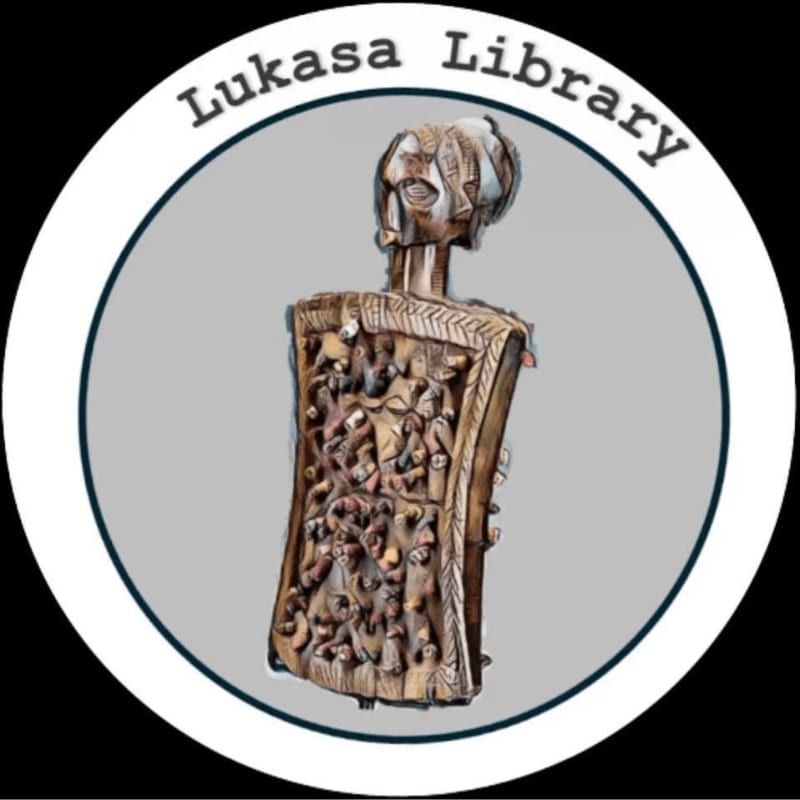 A carved wooden figure with intricate details stands in the foreground against a gray circular background with the text "Lukasa Library" above it.