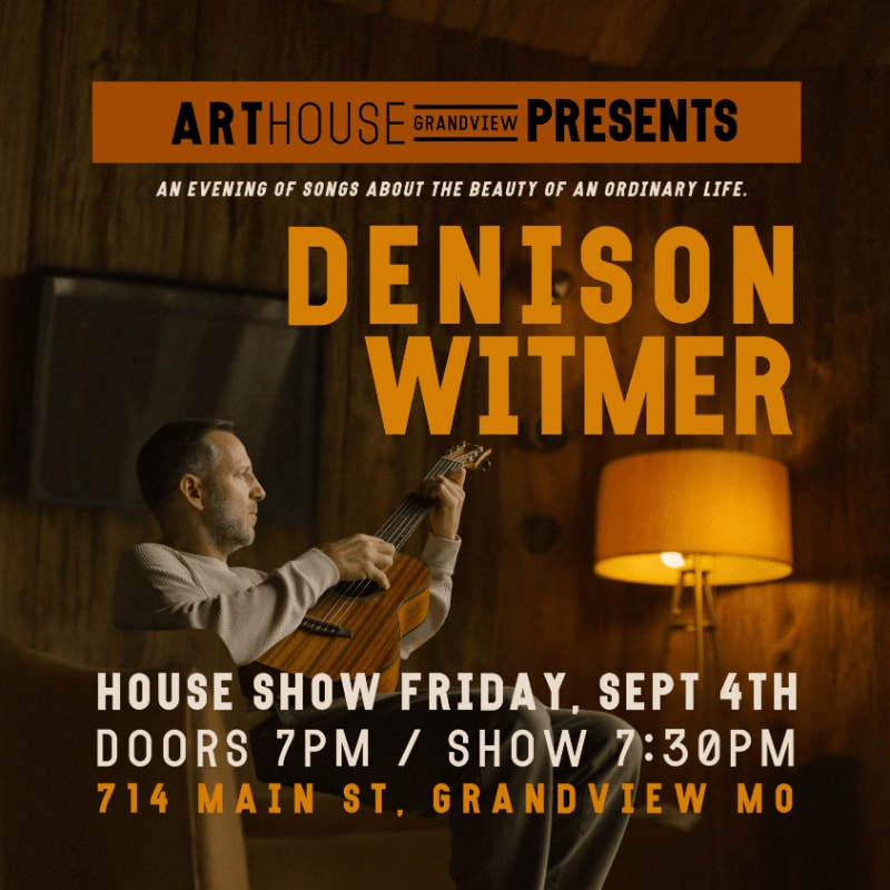 A man plays an acoustic guitar in a dimly lit room with a lamp and framed picture in the background, advertising an Arthouse Grandview Presents event featuring Denison Witmer.