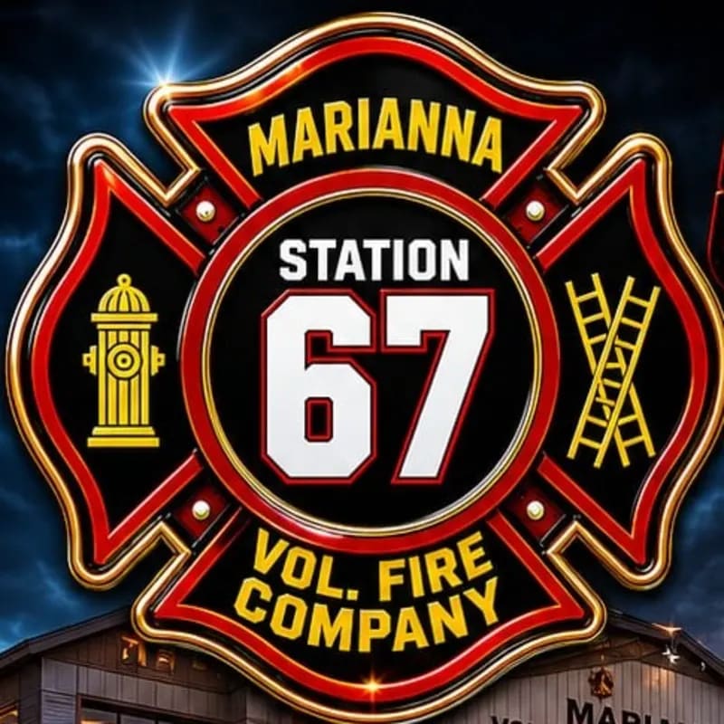 A Maltese cross emblem for Marianna Station 67 Vol. Fire Company, featuring a hydrant and ladder, is superimposed over a building with a dark, cloudy sky in the background.