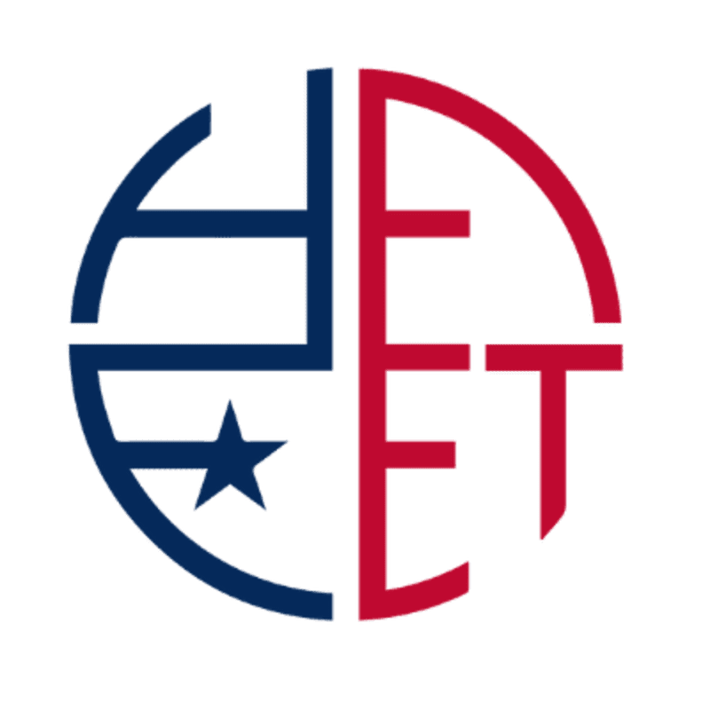 A circular logo with the letters "HEET" in red and blue, featuring a star on the left side, is set against a white background.