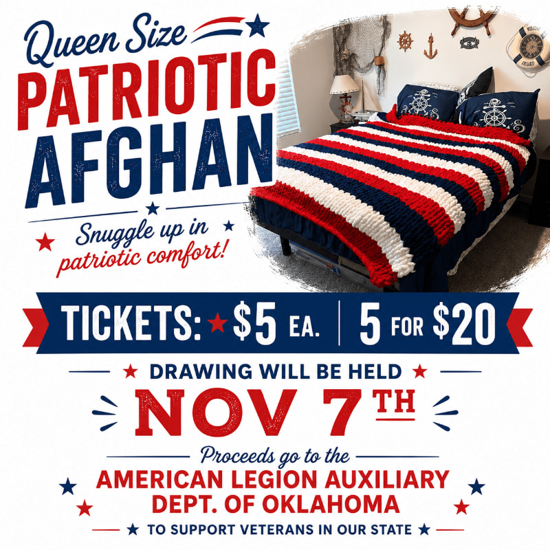 A queen-sized patriotic afghan is displayed on a bed in a room decorated with nautical-themed items, with ticket information for a drawing to benefit the American Legion Auxiliary of Oklahoma prominently featured in the foreground.