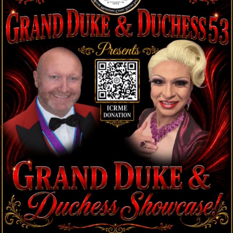 A smiling man in a tuxedo and a woman in drag with elaborate makeup and blonde hair are featured in the foreground, with a QR code and donation information between them, all set against a dark, ornate background with red accents.