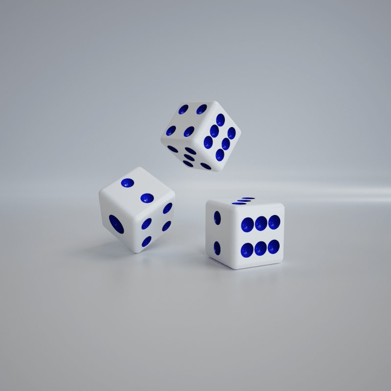 three white dices with blue dots on them