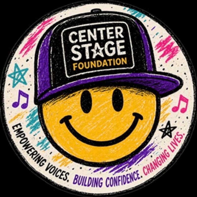 A yellow smiley face wearing a purple and black baseball cap with "CENTER STAGE FOUNDATION" on it is surrounded by colorful abstract lines, musical notes, and stars, with a circular text banner at the bottom reading "EMPOWERING VOICES. BUILDING CONFIDENCE. CHANGING LIVES."