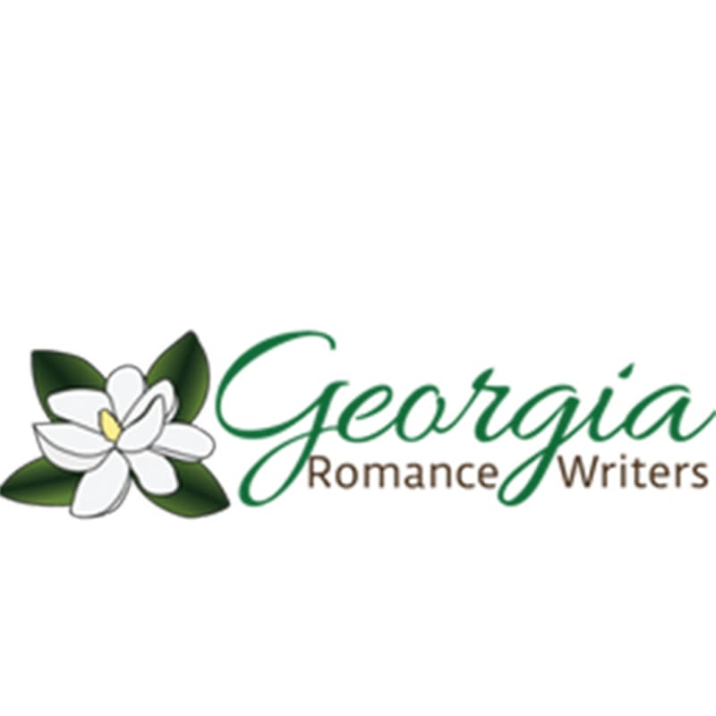 A white magnolia with green leaves is on the left, and the words "Georgia Romance Writers" are on the right, all against a white background.