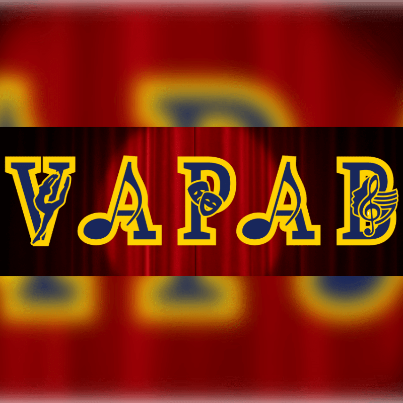 The foreground displays the letters "VAPAD" in blue with yellow outlines, each creatively incorporating artistic symbols, set against a backdrop of red stage curtains.