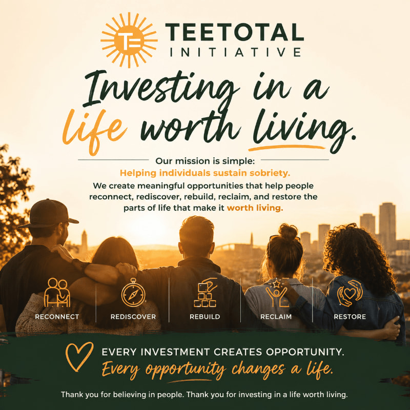 Four individuals embrace each other in the foreground, looking out at a city skyline bathed in the warm glow of sunset, with the "Teetotal Initiative" logo and mission statement prominently displayed above.