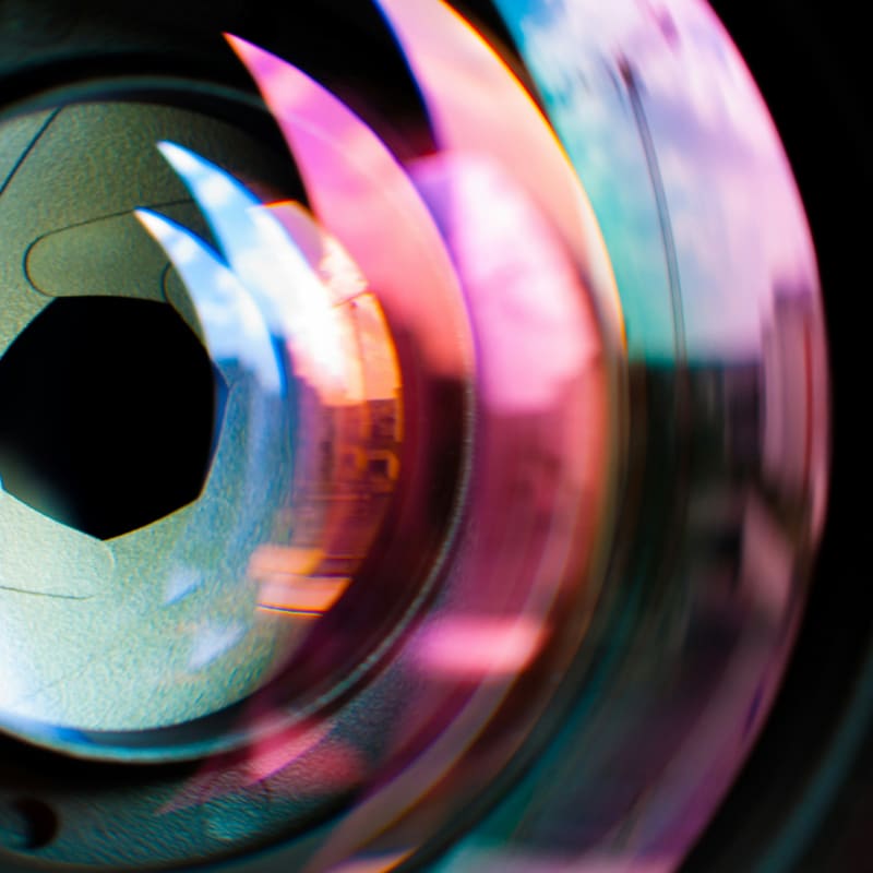 a close up of a lens with a blurry background