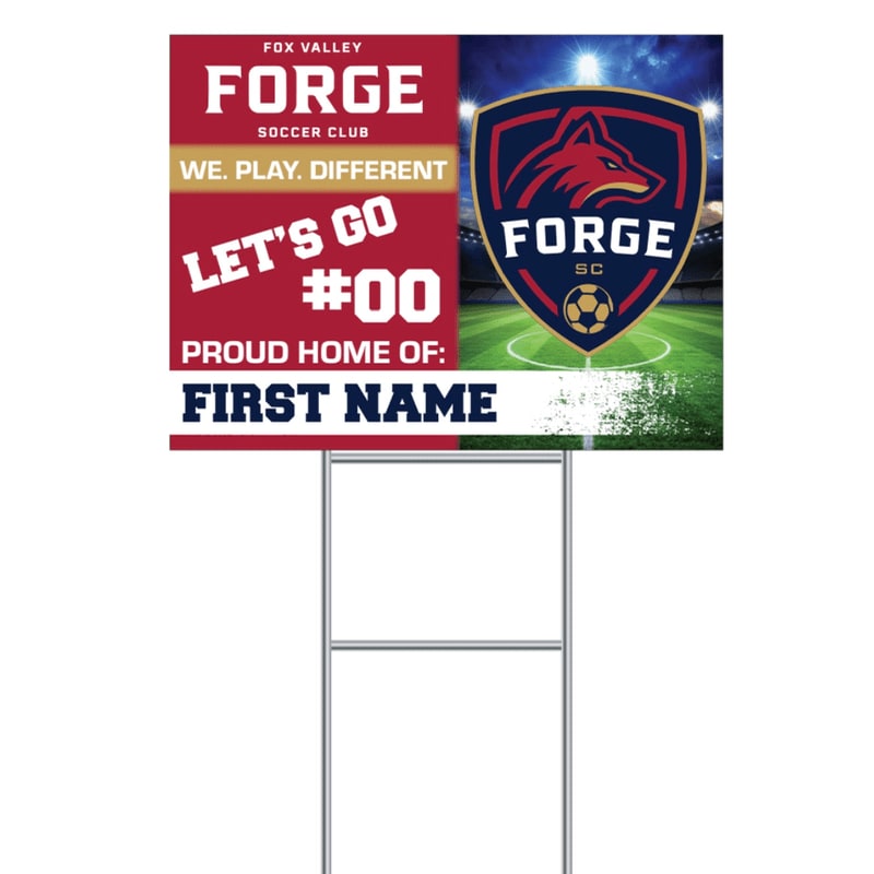 A red and white yard sign for the Fox Valley Forge Soccer Club features the team's logo and customizable text in the foreground, set against a blurred background of a soccer field at night.