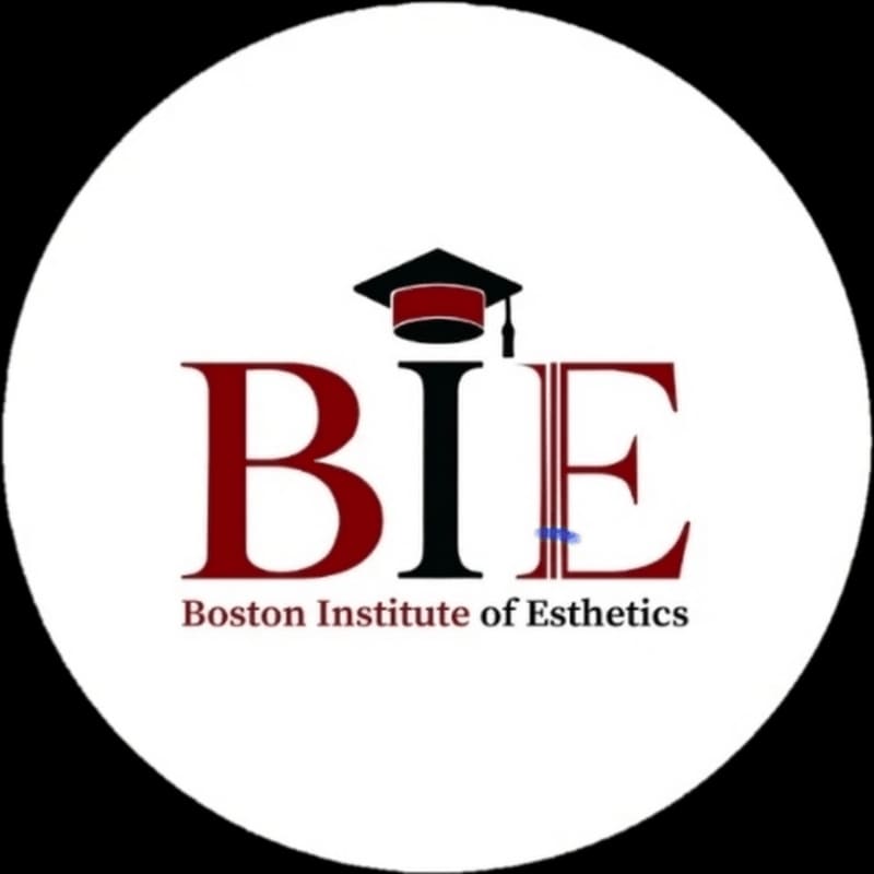 A graduation cap sits atop the letters "BIE" in dark red, with "Boston Institute of Esthetics" written below, all within a white circle against a black background.