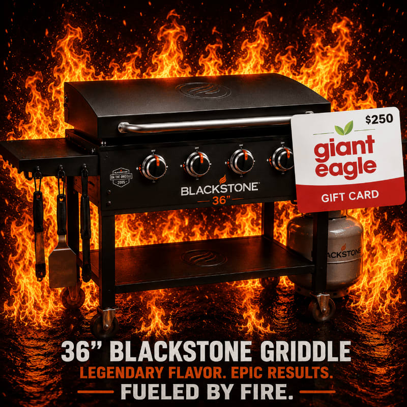 A Blackstone 36" griddle with a Giant Eagle gift card sits in front of a fiery background.