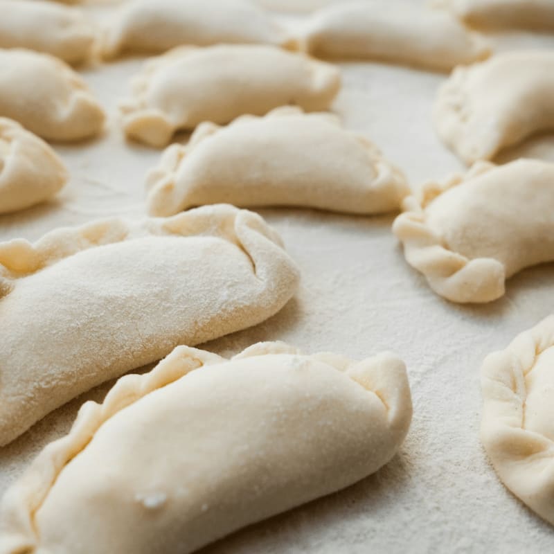 dumplings on white surface