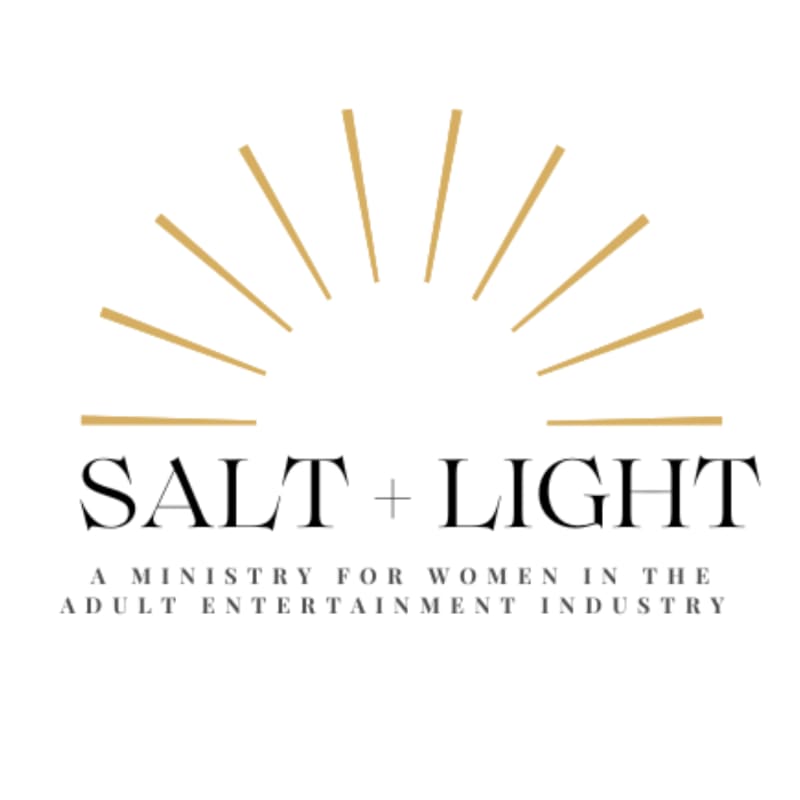 Golden rays emanate from a semi-circle above the words "SALT + LIGHT" and the tagline "A MINISTRY FOR WOMEN IN THE ADULT ENTERTAINMENT INDUSTRY" on a white background.