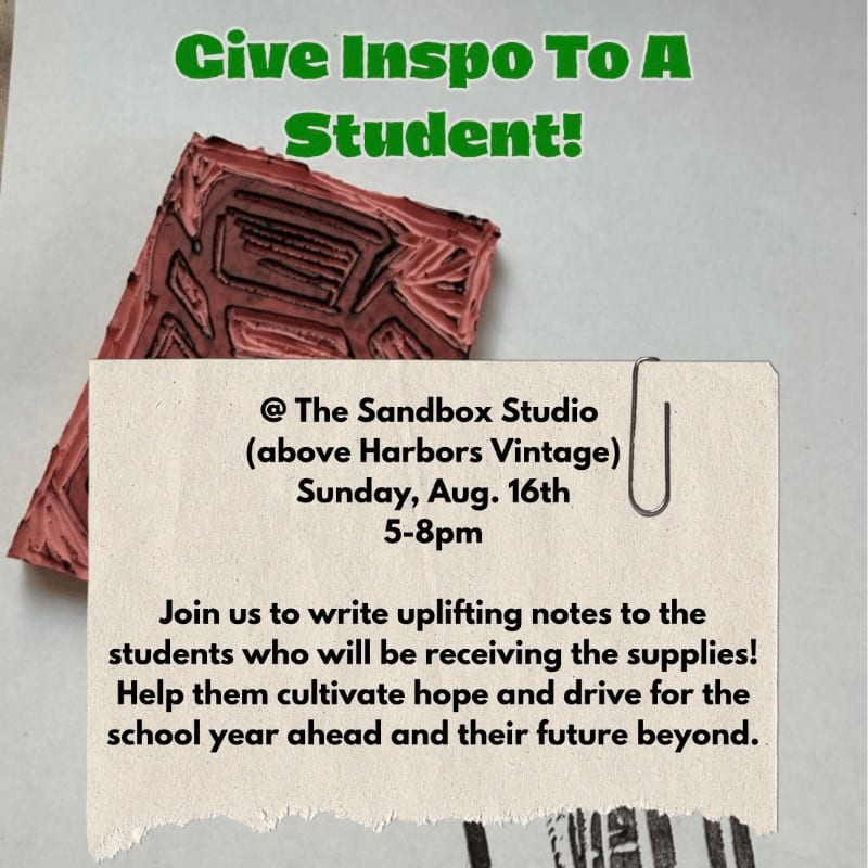 A carved rubber stamp rests on a textured background, with a torn piece of paper featuring event details clipped to it.