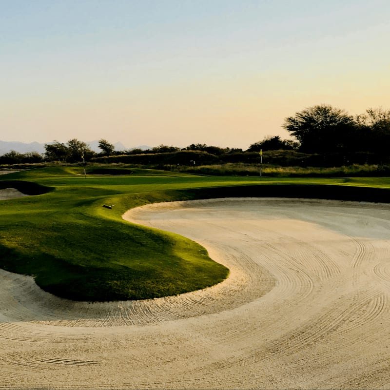 golf field under clear blue sky