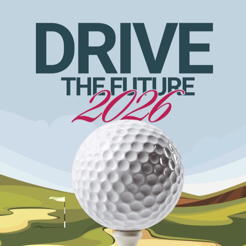 A golf ball sits on a tee in the foreground, with the words "DRIVE THE FUTURE 2026" above a stylized golf course in the background.