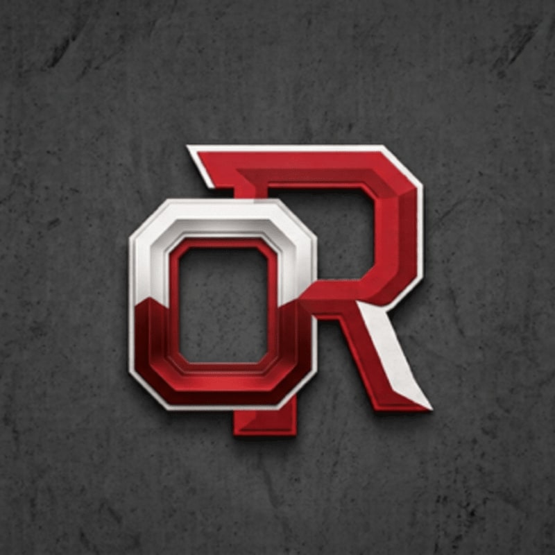 A red and white metallic logo with the letters "QR" is centered on a dark, textured background.
