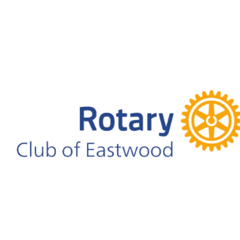 The foreground features the words "Rotary Club of Eastwood" in blue text next to a yellow gear emblem, all set against a plain white background.
