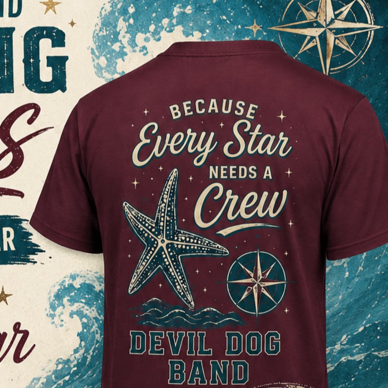 A maroon t-shirt with a starfish and compass design is displayed against a background of crashing waves and nautical text.