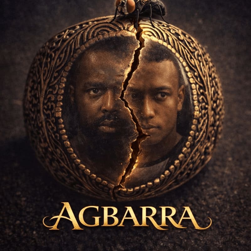 A cracked, ornate locket with two men's faces split down the middle rests on a dark, textured surface, with a fly perched on top.
