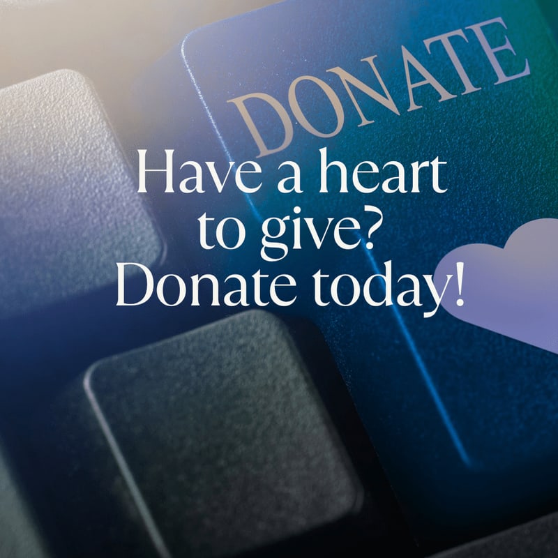 A close-up of a keyboard with the word "DONATE" prominently displayed on a key, accompanied by the text "Have a heart to give? Donate today!" and a subtle heart graphic in the background.