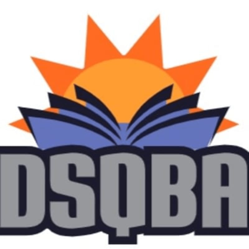 An open book with a sunburst behind it is superimposed over the letters "DSQBA".