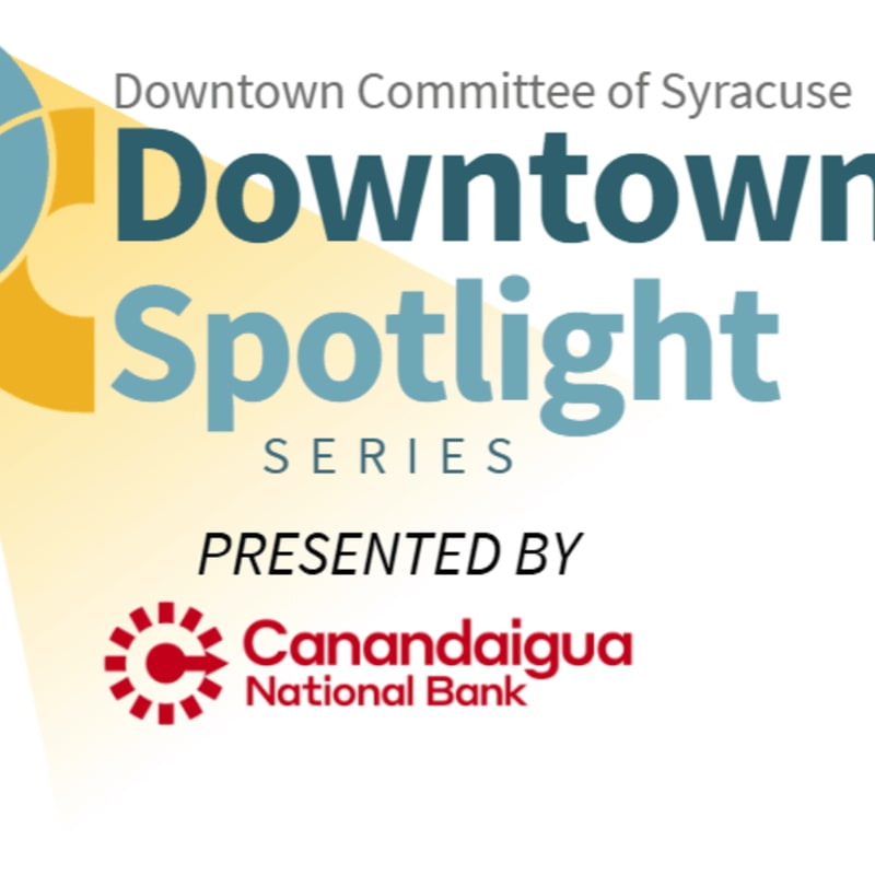 A yellow spotlight illuminates the "Downtown Spotlight Series" logo in the foreground, with the "Downtown Committee of Syracuse" text above and "Presented by Canandaigua National Bank" below, all set against a white background.