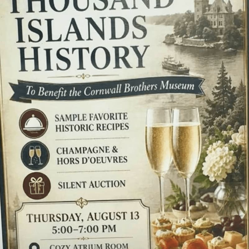Two glasses of champagne and hors d'oeuvres are in the foreground, with a vintage scene of boats on a river and trees in the background.