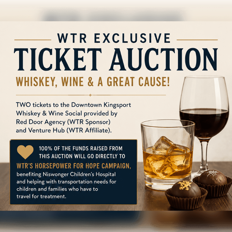 Two glasses of whiskey and two chocolates sit on a wooden surface in the foreground, with text about a ticket auction for a good cause in the background.