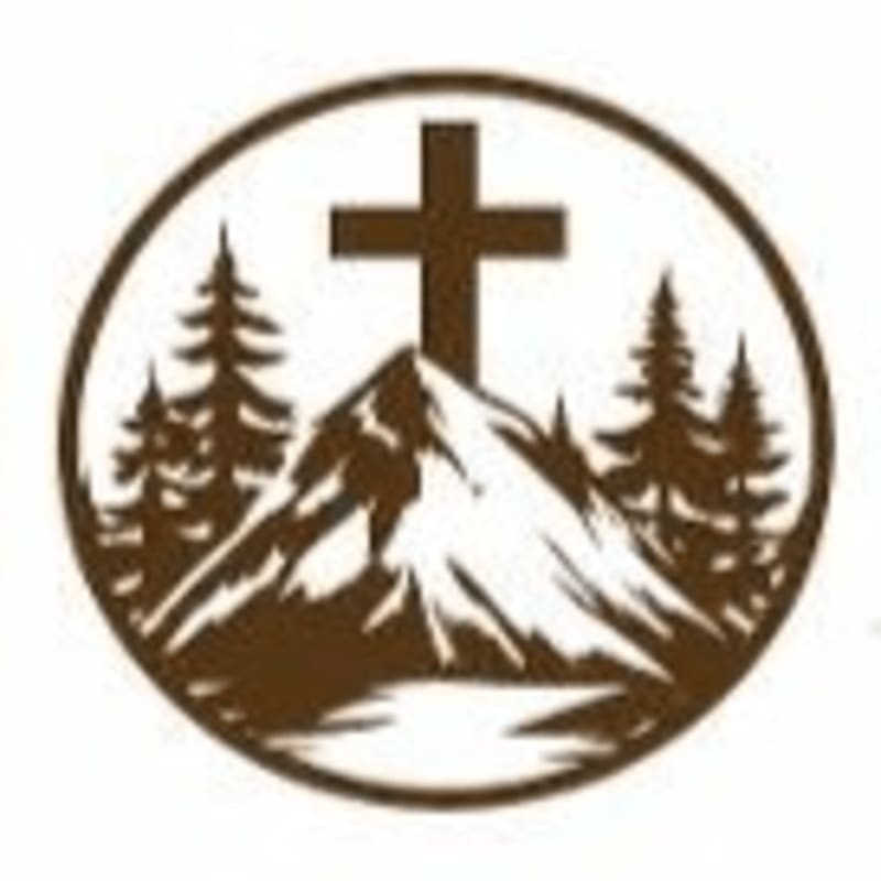 A brown silhouette within a circle features a prominent cross atop a mountain, with pine trees on either side and a body of water in the foreground.