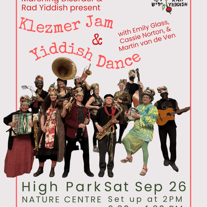 A group of musicians in colorful attire, some playing instruments like a saxophone and accordion, pose in the foreground with a poster advertising a "Klezmer Jam & Yiddish Dance" event in the background.