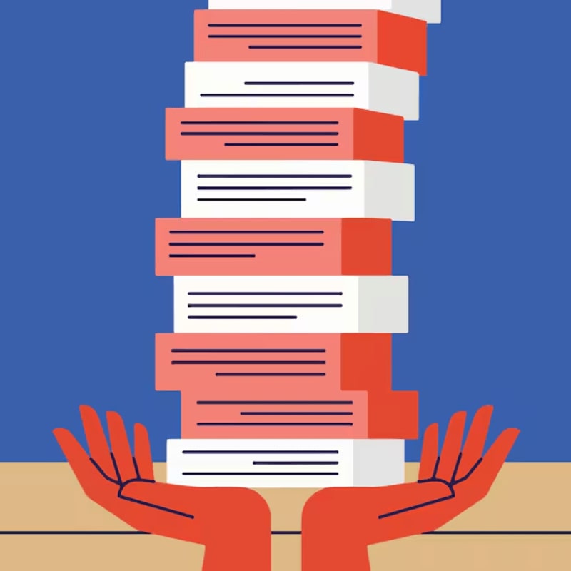 Two red hands hold a tall stack of red and white books against a blue background.