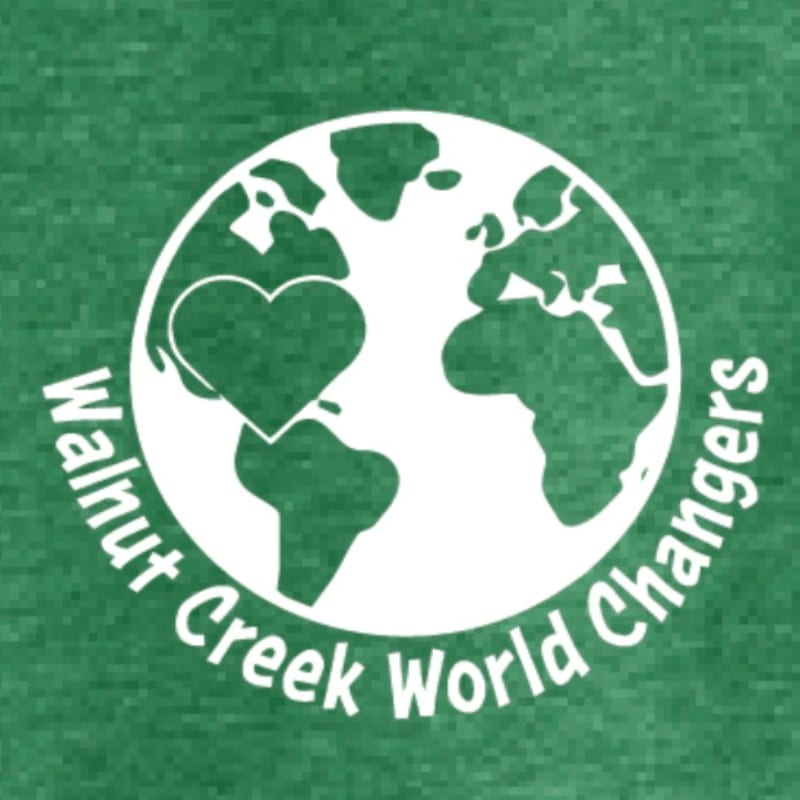 A white globe with a heart overlay and the text "Walnut Creek World Changers" curves around it, set against a green heathered background.