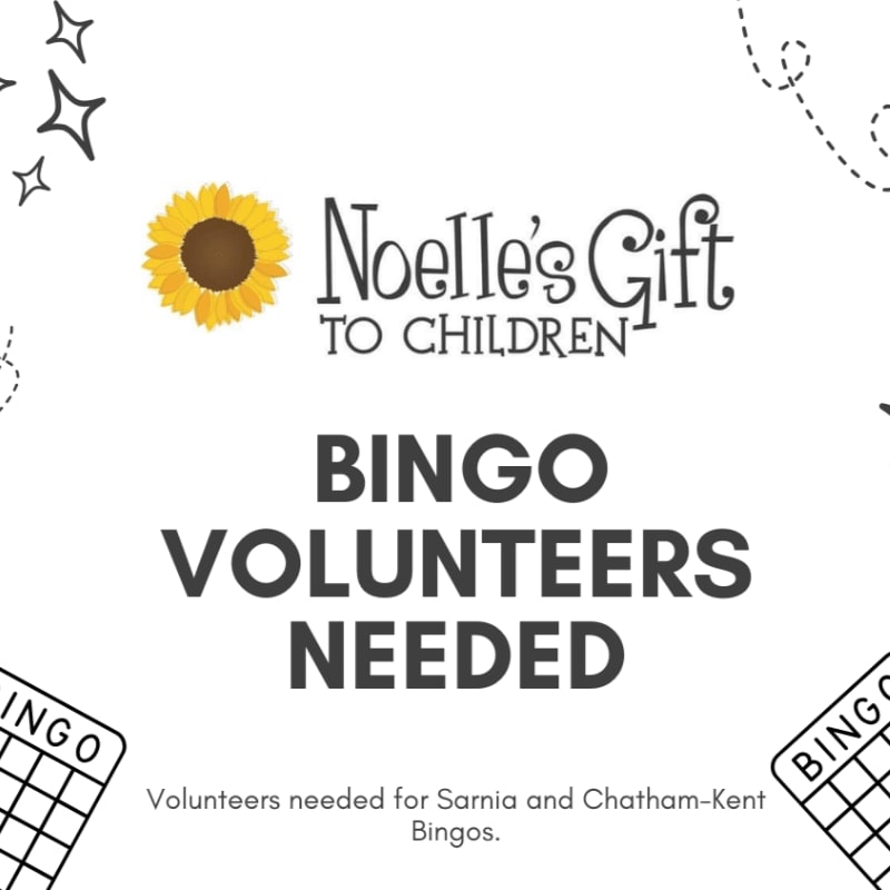 In the foreground, two bingo cards are visible, while the background features the text "BINGO VOLUNTEERS NEEDED" and the "Noelle's Gift to Children" logo with a sunflower.