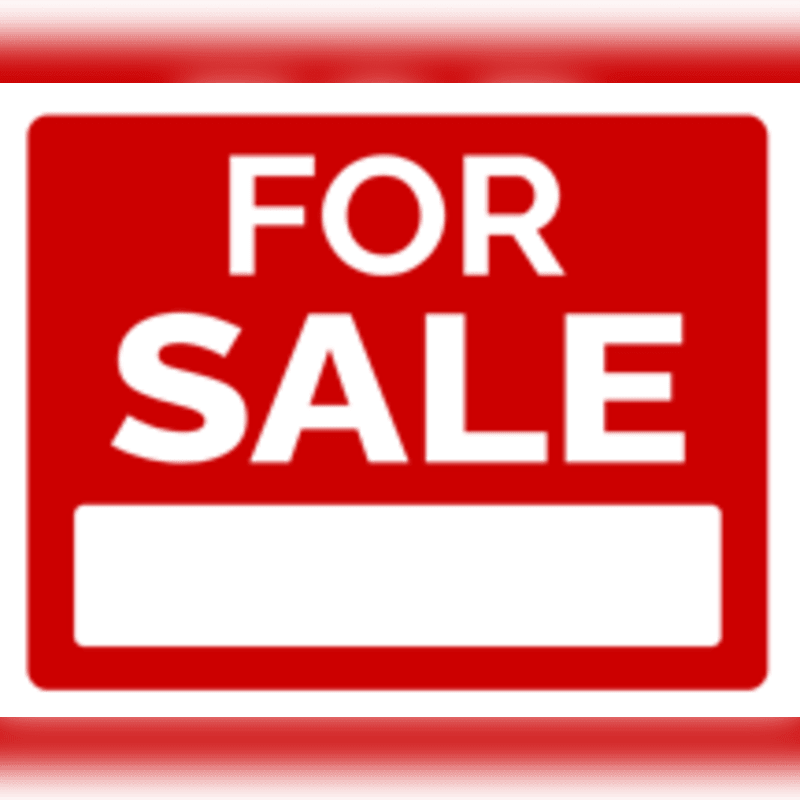 A red "FOR SALE" sign with a blank white space for text is centered against a blurred red and white gradient background.