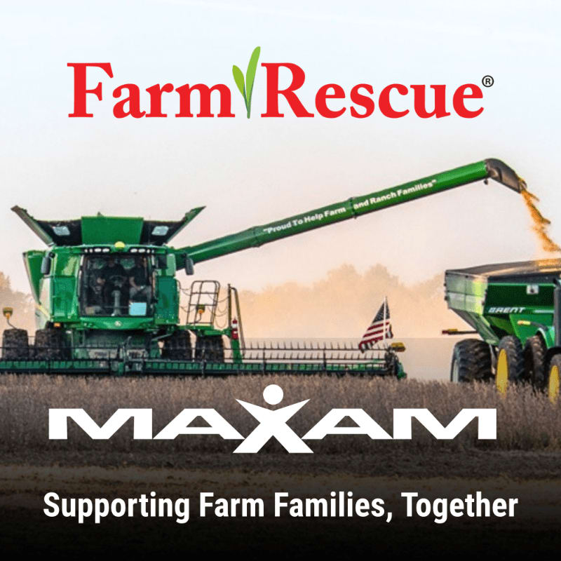 A green combine harvests crops into a trailer, with the Farm Rescue and MAXAM logos above a field and a soft, hazy sky.