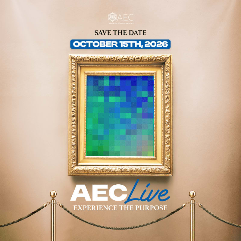 A golden framed painting with a pixelated image hangs on a beige wall, with velvet ropes in the foreground and "AEC Live" text below.