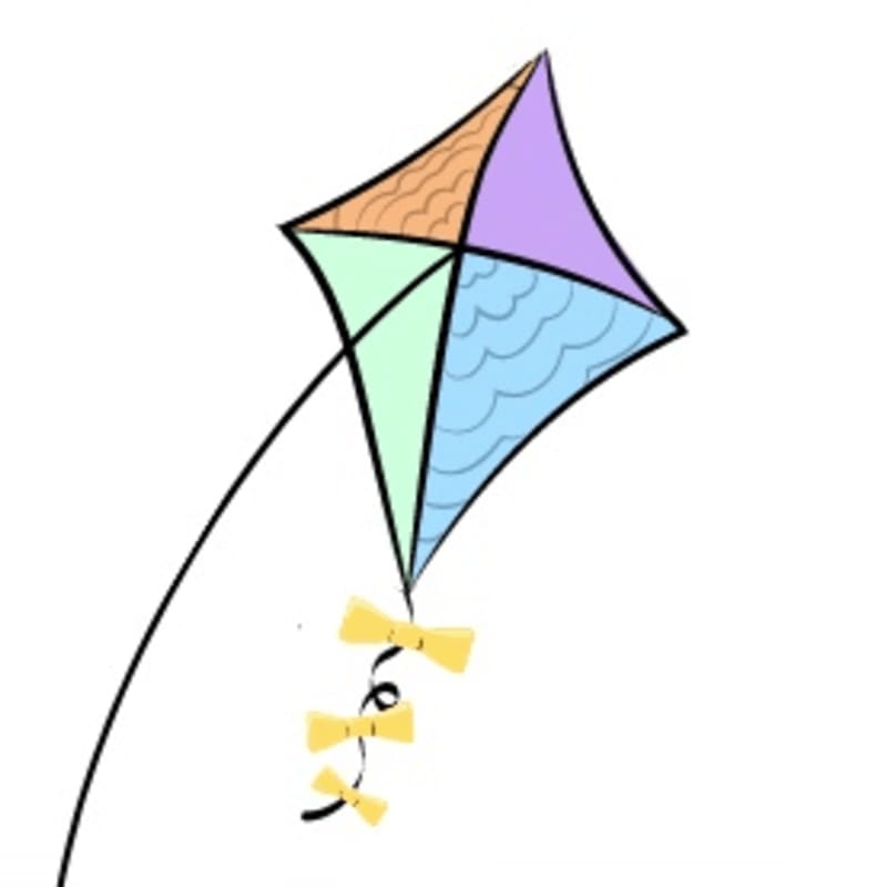 A colorful kite with yellow bows on its tail flies against a plain white background.