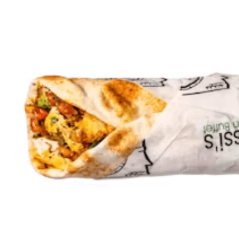 A tightly wrapped chicken shawarma, with visible fillings of tomatoes and herbs, is presented against a white background with subtle text on the paper wrapper.