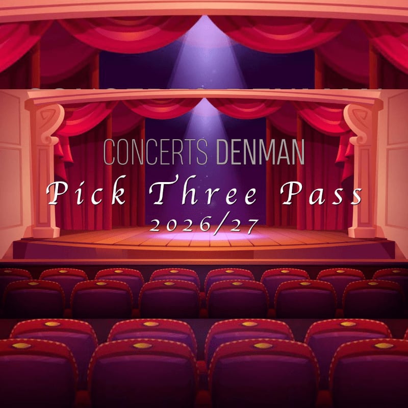 Rows of plush purple seats fill the foreground, leading to a brightly lit stage framed by red velvet curtains in the background, with "CONCERTS DENMAN Pick Three Pass 2026/27" text overlaid.
