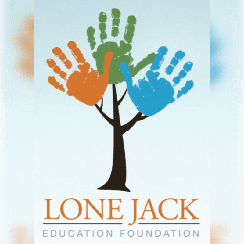 A stylized tree with colorful handprints for leaves stands against a light blue gradient background, with the text "LONE JACK EDUCATION FOUNDATION" below.