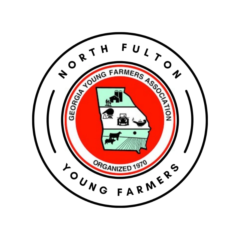 A circular emblem with a white background features a red and white inner circle containing a map of Georgia with agricultural symbols, and text around the border reads "NORTH FULTON YOUNG FARMERS GEORGIA YOUNG FARMERS ASSOCIATION ORGANIZED 1970".