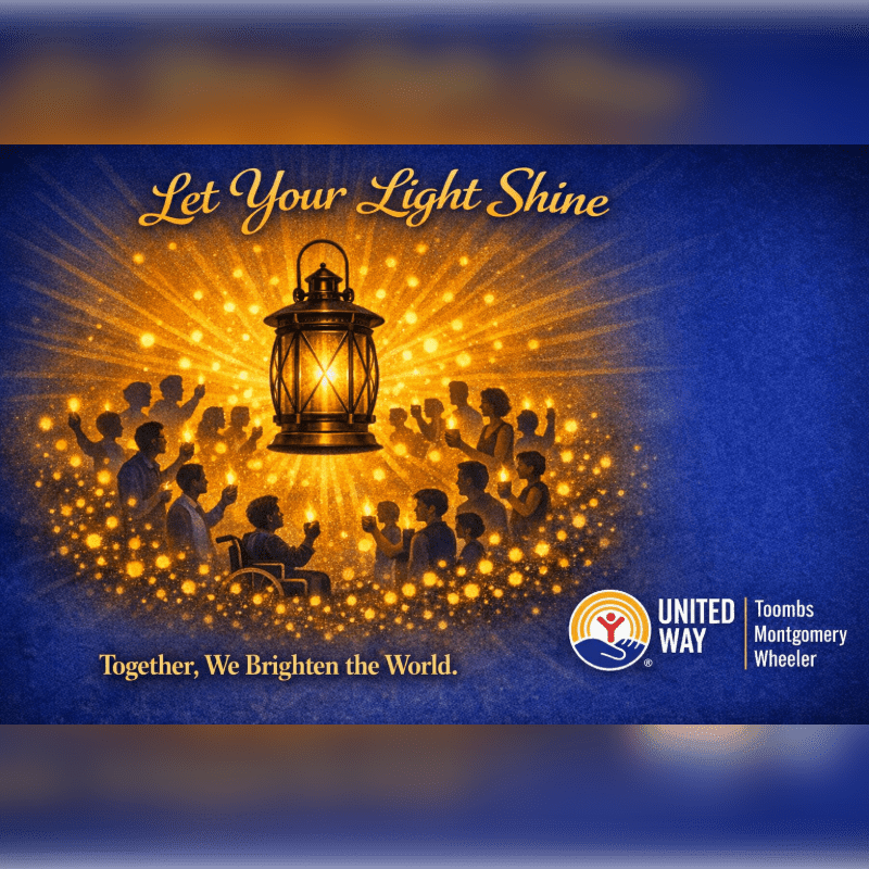 A glowing lantern illuminates a diverse group of people holding candles in the foreground, set against a dark blue background with the United Way logo and text.