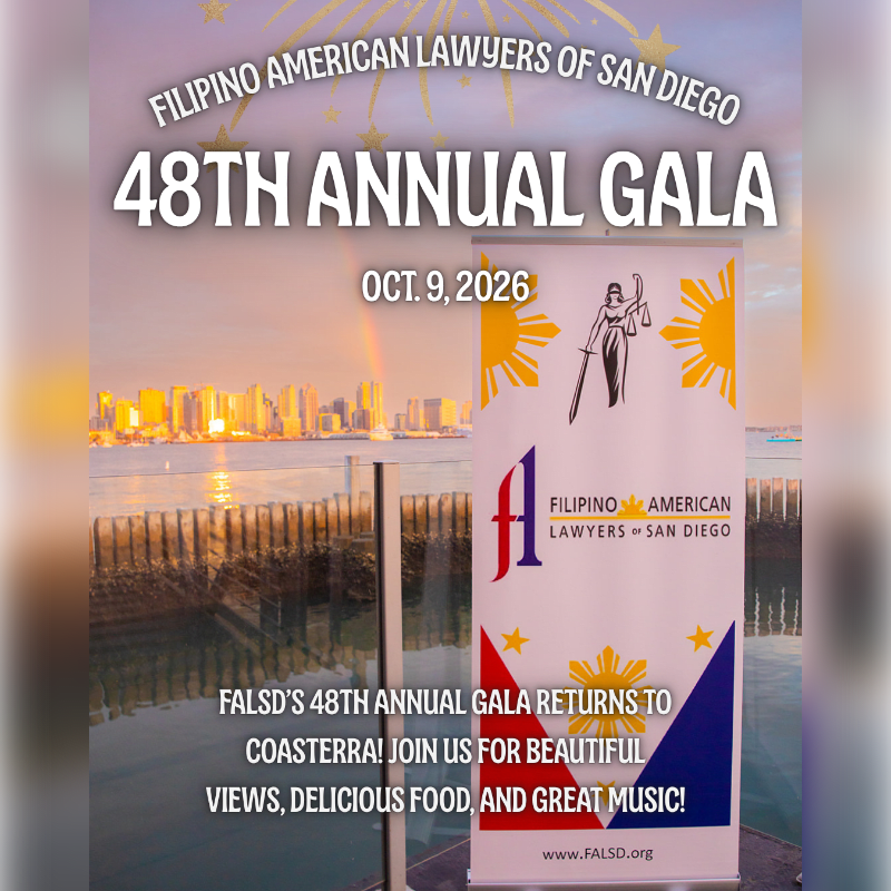 A banner for the Filipino American Lawyers of San Diego's 48th Annual Gala stands in the foreground against a backdrop of a city skyline at sunset.