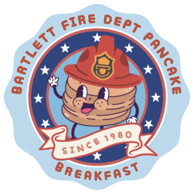A smiling stack of pancakes wearing a firefighter's helmet waves from the foreground, set against a circular background with stars and the text "BARTLETT FIRE DEPT PANCAKE BREAKFAST SINCE 1980".