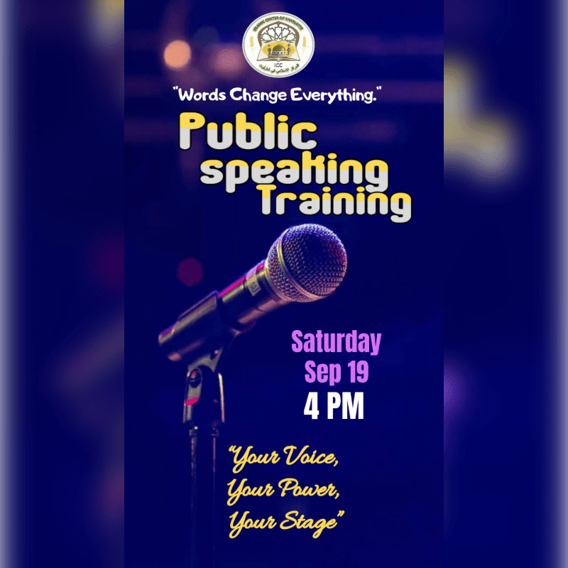 A microphone stands in the foreground against a dark, blurred background with text advertising a public speaking training event.