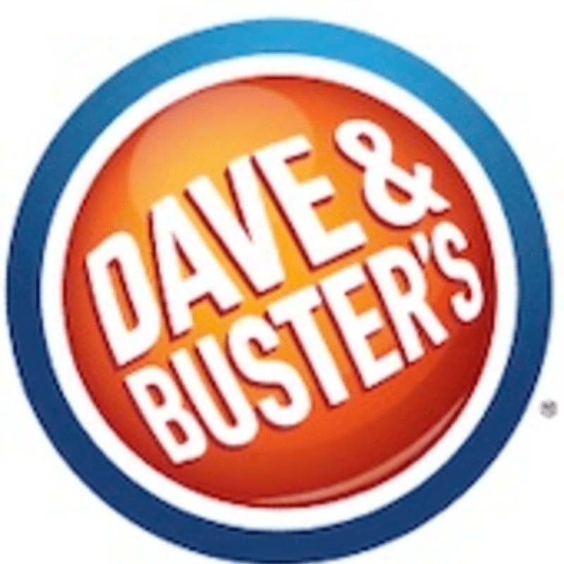 A bright orange and red circular logo with white text reading "DAVE & BUSTER'S" is set against a white background.